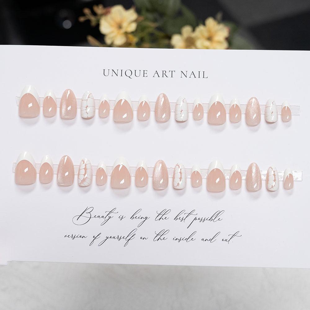 Artistic Press-On Nail Set with Elegant French Tips and Glitter Accents