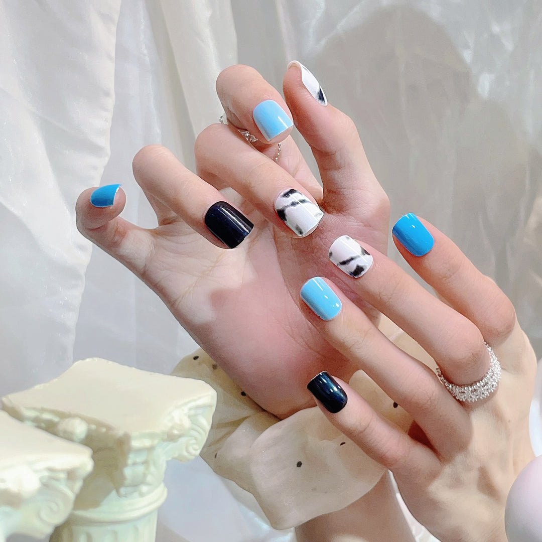 Artistic Press-On Nail Set with Marbled Patterns
