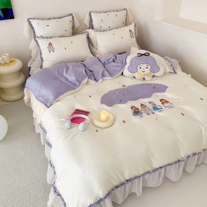 Children's bedding set with embroidered doll appliqués, ruffle and cuddle pillow
