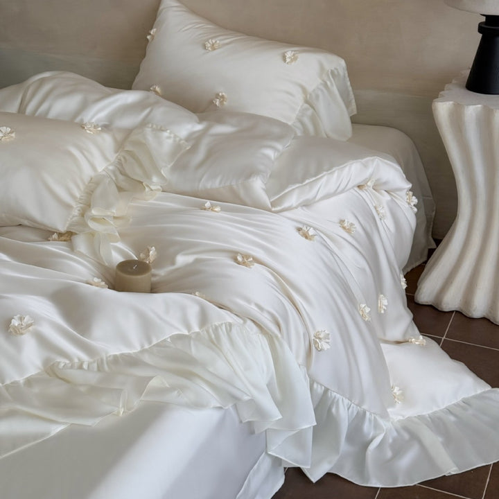 Luxurious satin bedding set with ruffles and 3D flowers