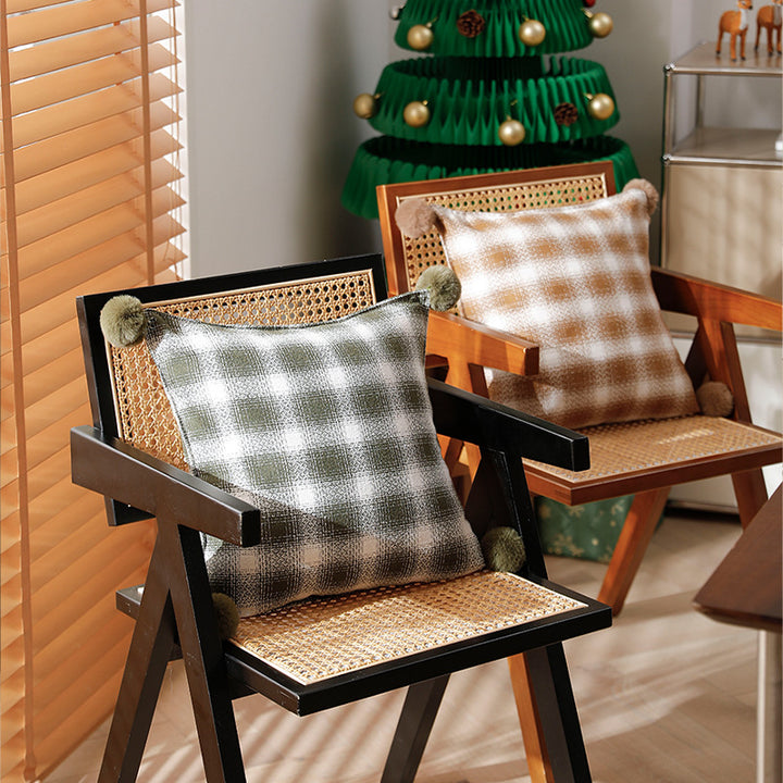 Square living decorative pillow with woven check structure and pom-pom corners