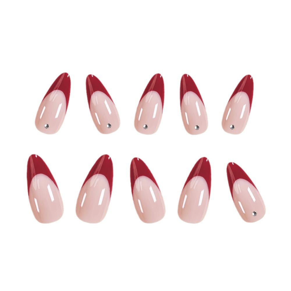 Elegant Stiletto Nail Art with Rhinestone Accents