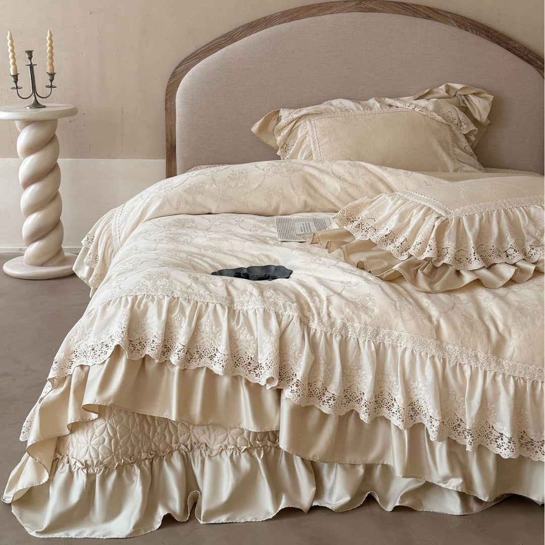 Vintage-inspired bedding set with layered ruffles and lace inset