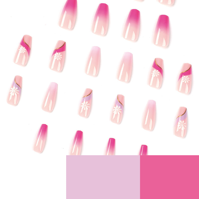 Artful nail extensions with colorful ombre design and floral accents Kalsten
