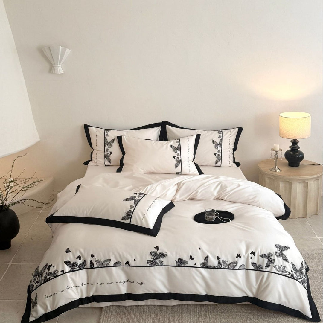 Bedding set with butterfly embroidery and contrast piping