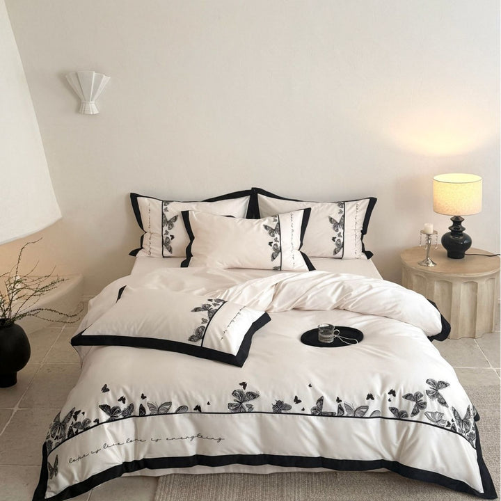 Bedding set with butterfly embroidery and contrast piping