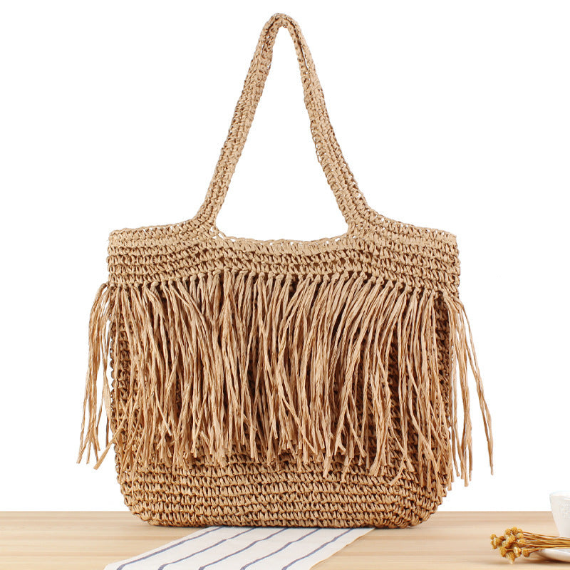 Designer straw bag with fringe decoration Kalsten