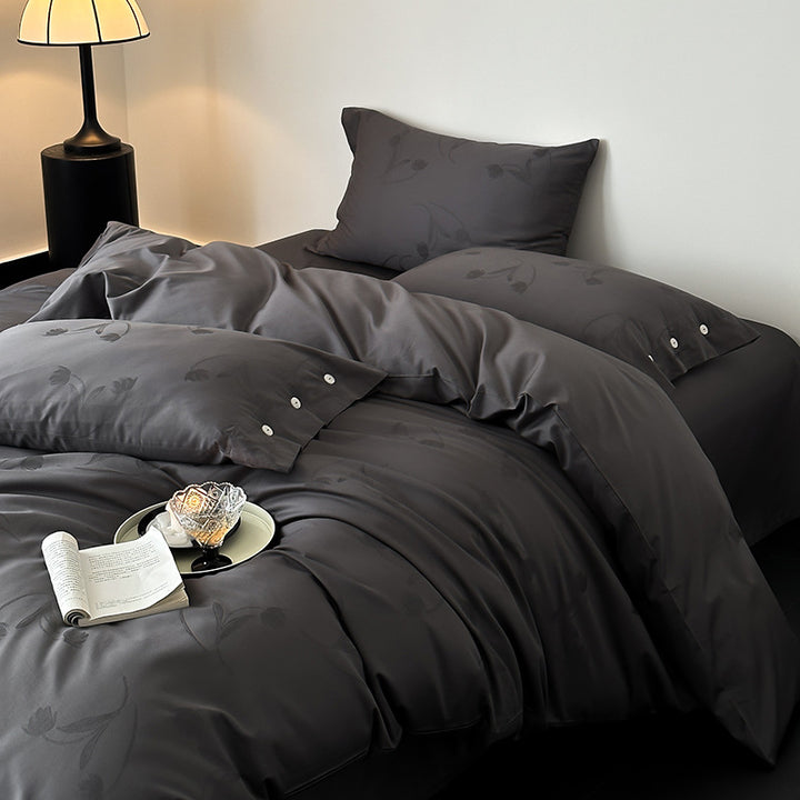 Premium duvet cover set made of cotton satin with tonal floral jacquard and button closure