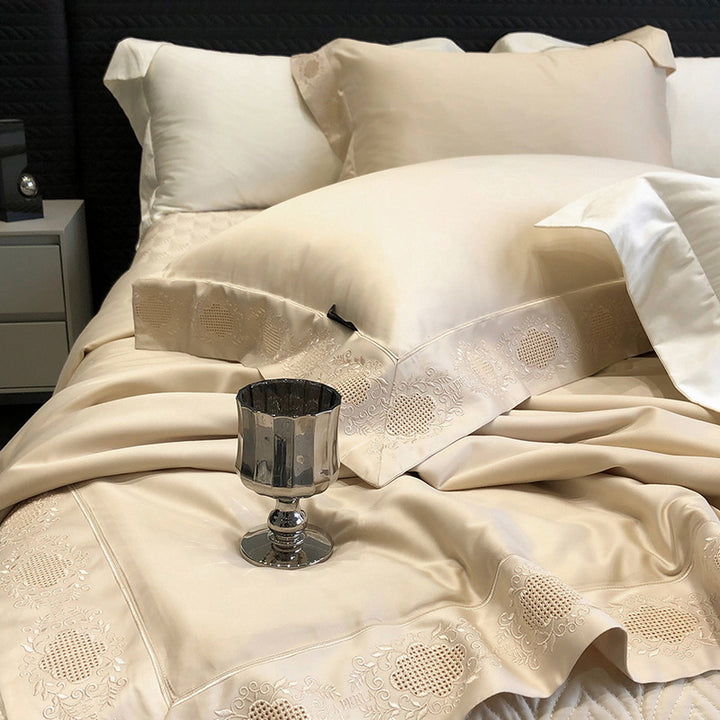 High-gloss satin bed linen set with floral cutwork embroidery border
