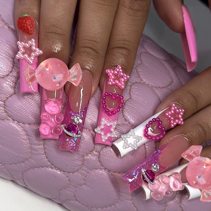 Glamorous artificial nail set with sparkling rhinestones and cross decorations Kalsten