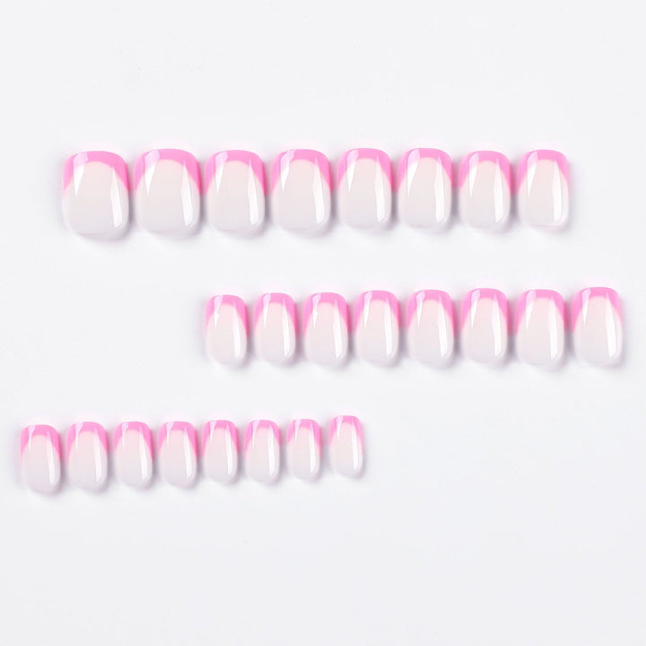 Artful nail design with elegant French tip and modern accents Kalsten