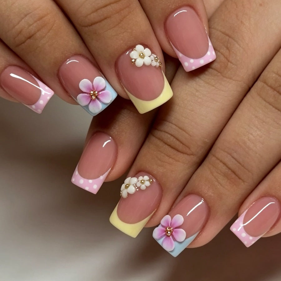 Acrylic nail set with floral accents and colorful tips Kalsten
