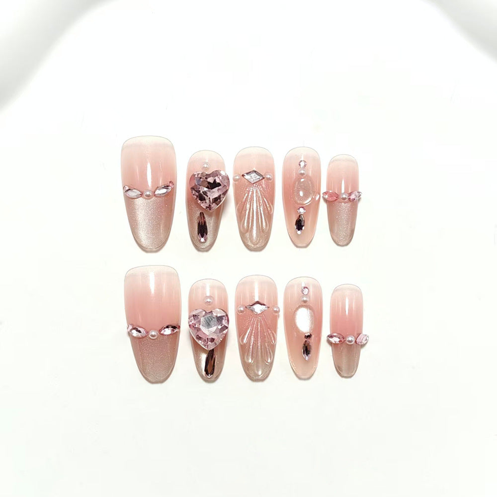 Artificial nails with sparkling heart and rhinestone accents Kalsten