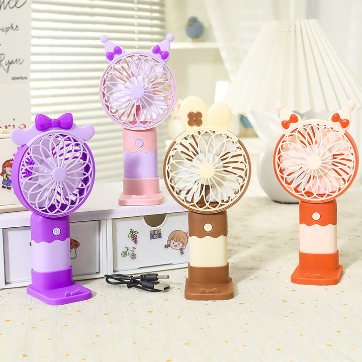 Women's portable mini hand fan with ergonomic handle and powerful battery Kalsten