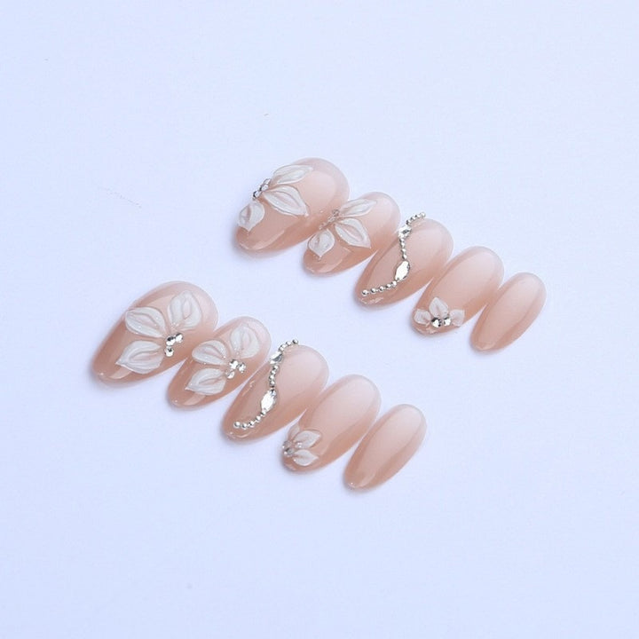 Acrylic nail set with elegant flower and glitter elements Kalsten