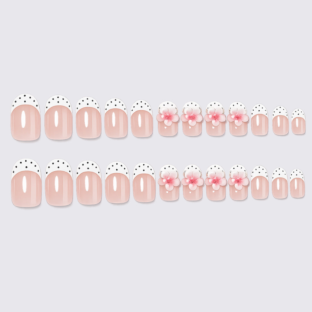 Artificial nail set with delicate floral designs and elegant accents Kalsten
