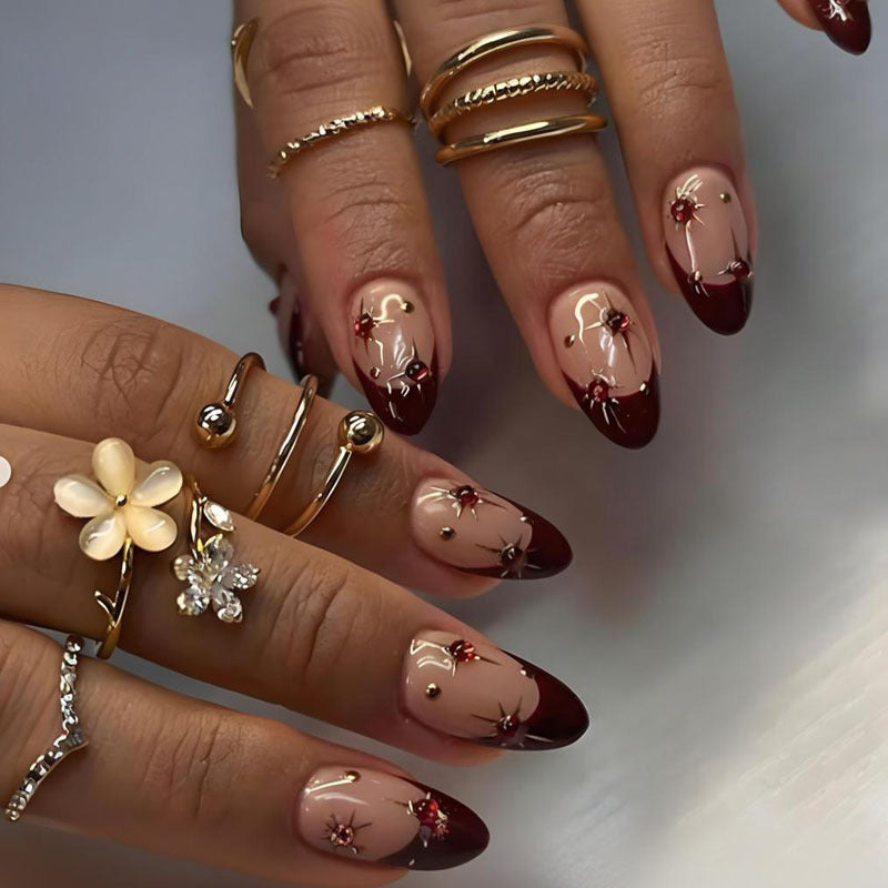 Acrylic nail set with glamorous embellishments and elegant accents Kalsten
