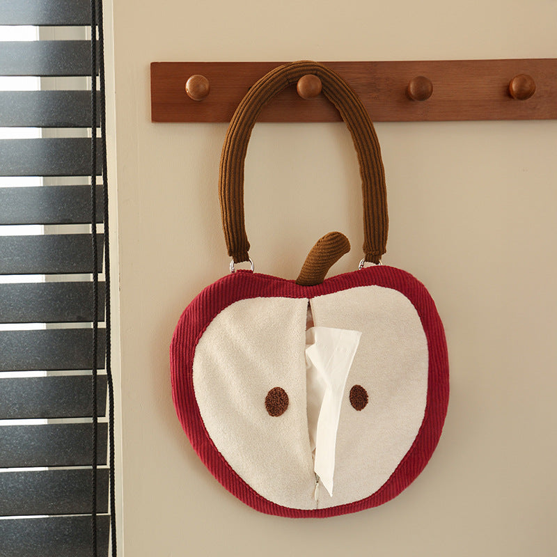 Wall-mounted handkerchief bag in apple shape with handle, plush applications and opening for tissues
