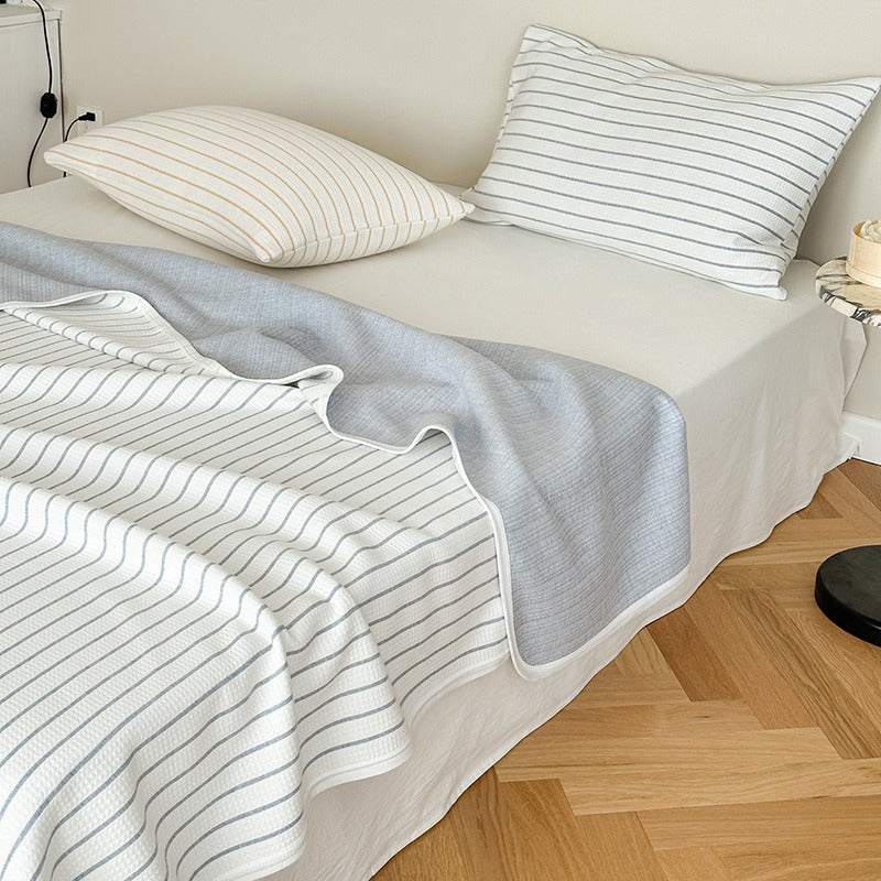 Reversible jacquard-knit blanket with fine stripes & matching pillowcase set