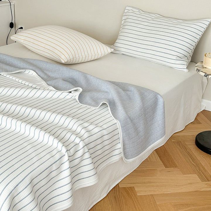 Reversible jacquard-knit blanket with fine stripes & matching pillowcase set