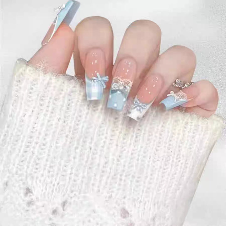 Artistic Press-On Nail Extensions with Floral Embellishments Kalsten