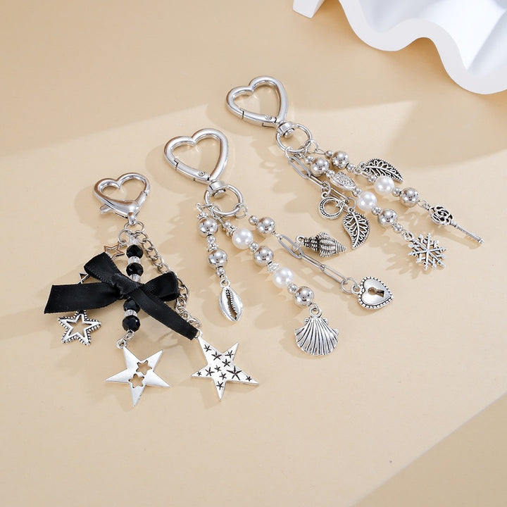 Keychain with Sparkling Stars and Bow Design Kalsten