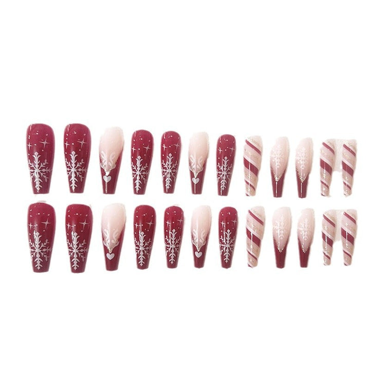Artistic Long Press-On Nail Set with Winter-Inspired Designs