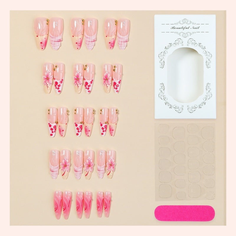 Creative art nail set with floral and glittering accents Kalsten