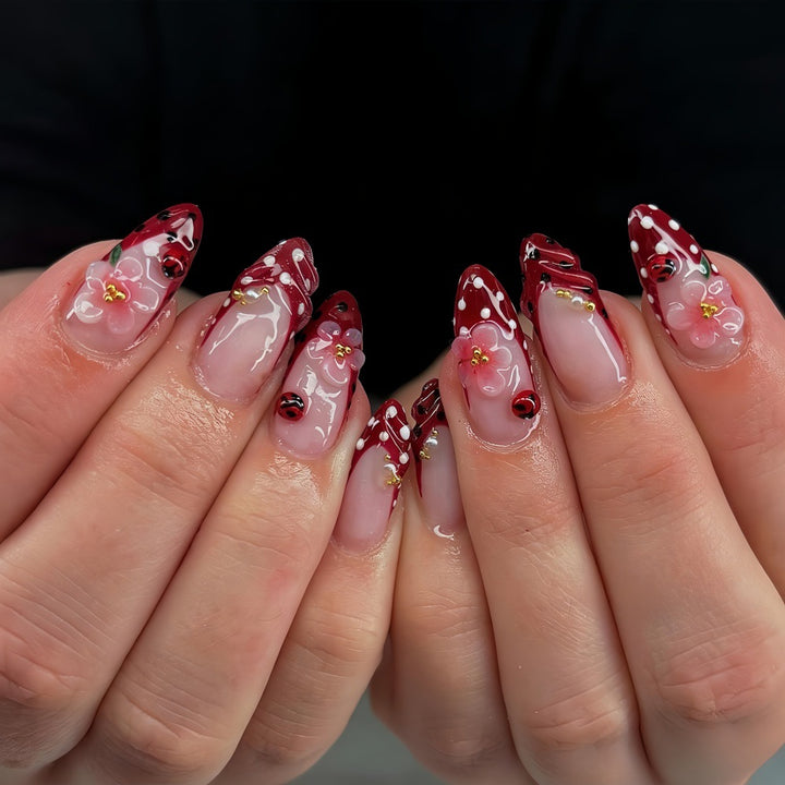 Artificial nails with floral design and 3D accents Kalsten
