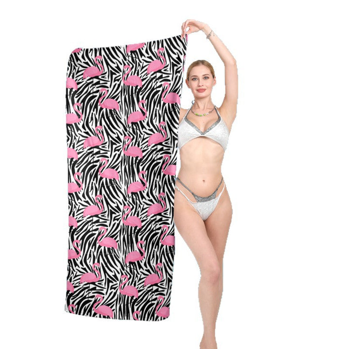 Beach towel with vibrant flamingo pattern and geometric design Kalsten