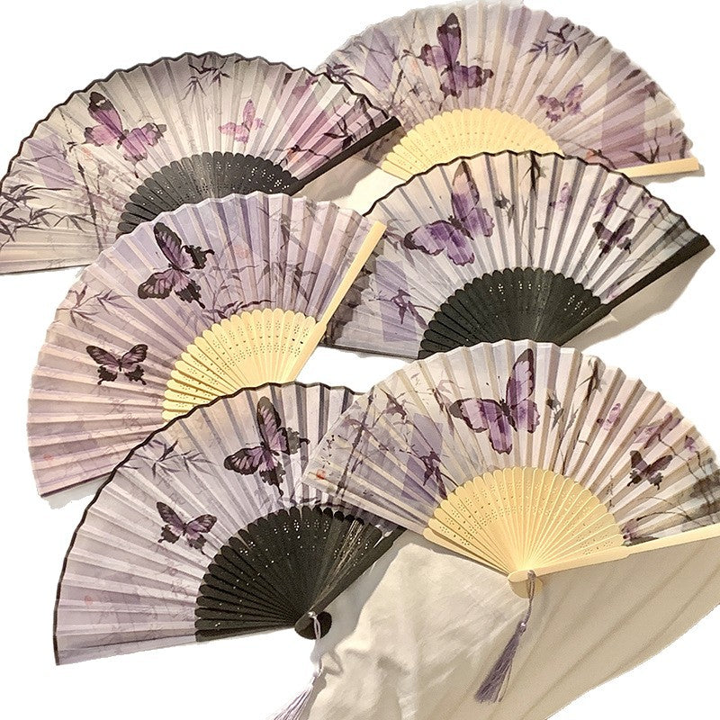 Elegant fan with elaborate butterfly motif Kalsten