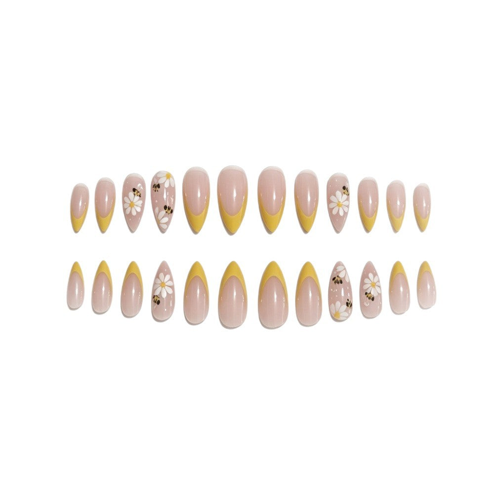 Artificial nails with elegant French tip and floral accents Kalsten
