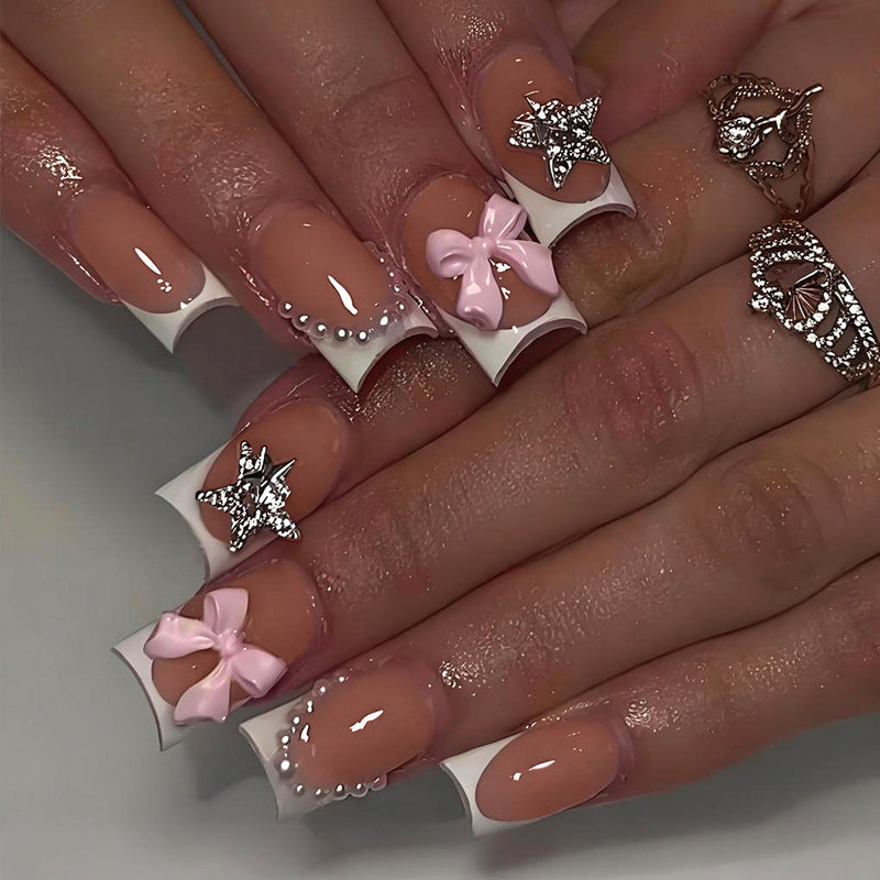 Acrylic nail set with elegant 3D flowers and glitter accents Kalsten
