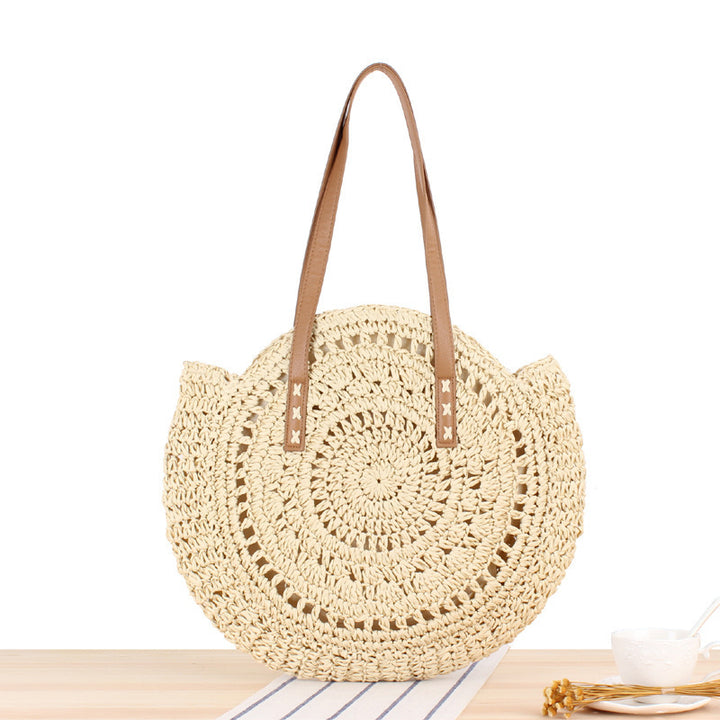 Round straw bag with leather handles Kalsten