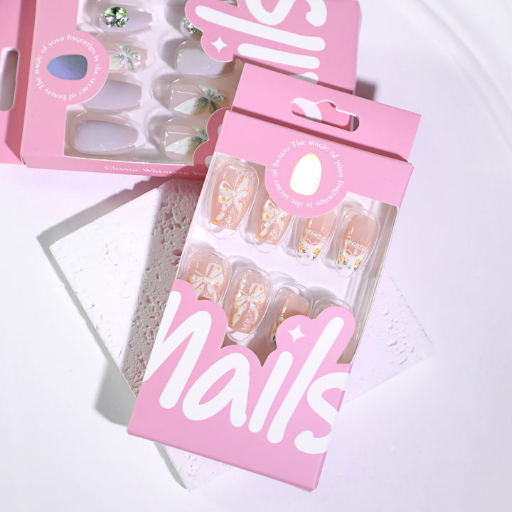 Artful Nail Extensions with Floral Design and Bow Accents Kalsten