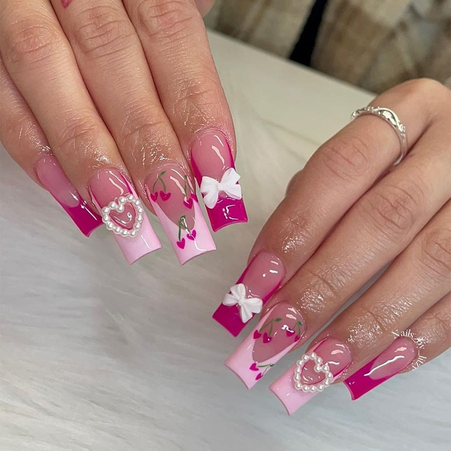 Nail art set with romantic cherry motifs and elegant accents Kalsten