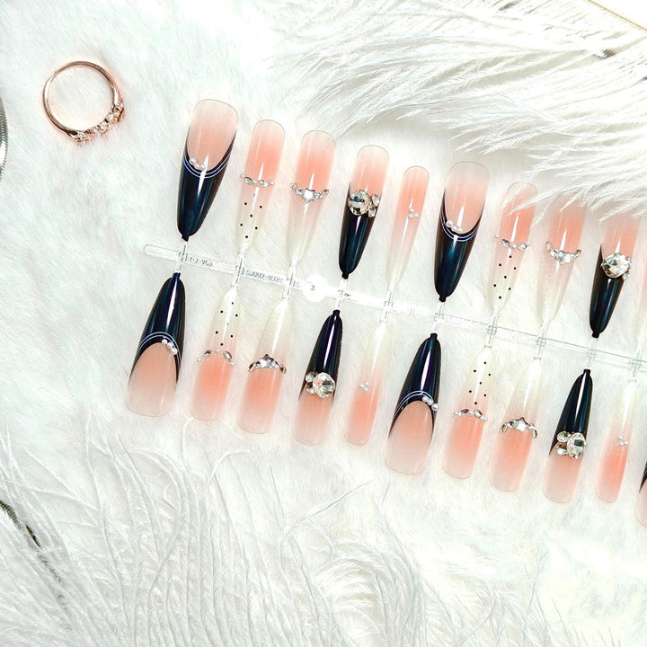 Glamorous artificial nails with glitter accents Kalsten