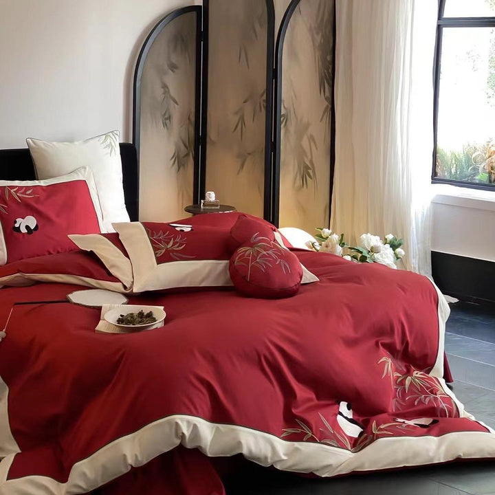 Duvet cover set made of cotton satin with applied animal embroidery and contrasting hem edge