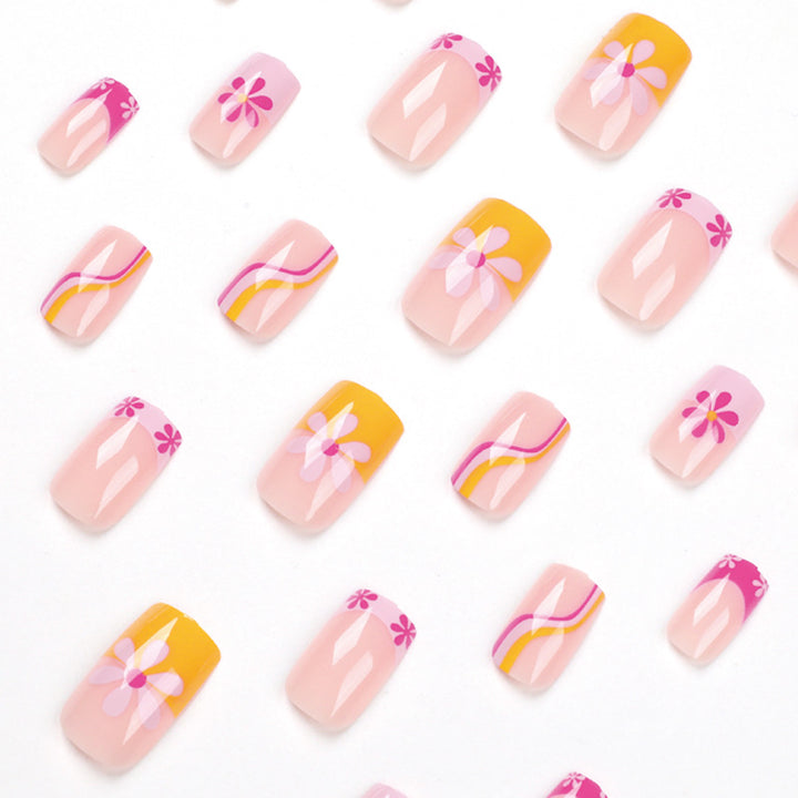 Creative Nail Art with Floral Design and Colorful Accents Kalsten