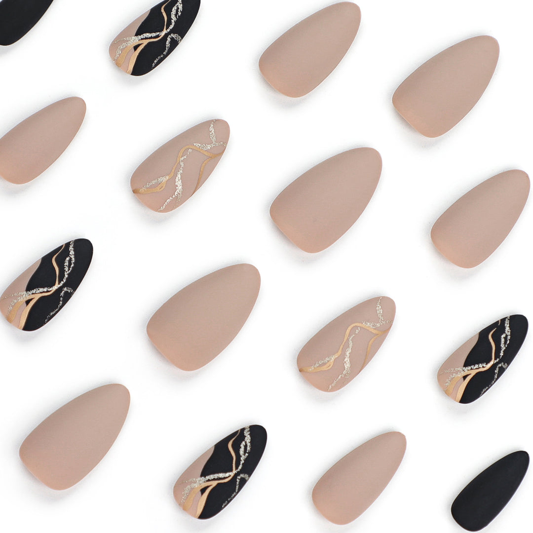 Artful nail designs with elegant gold accent Kalsten