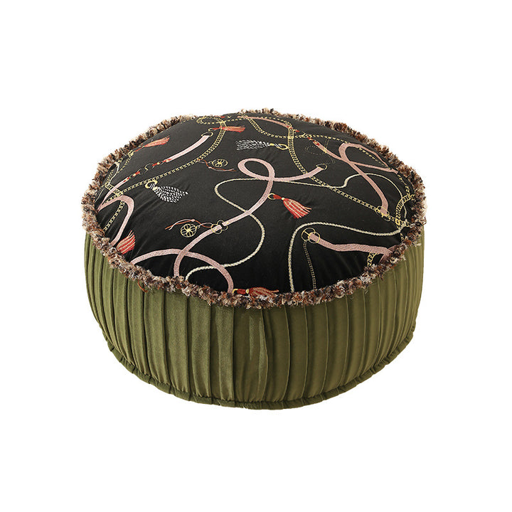 Beef seat pouf with embroidered top, pleated side panel and decorative fringe edge