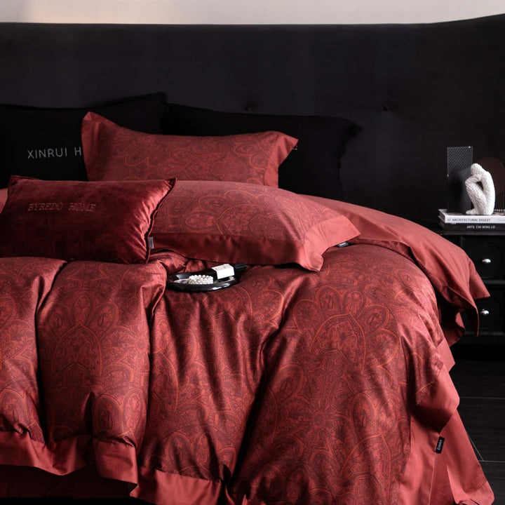 Reversible cotton satin bedding set with floral jacquard, contrast piping and decorative cushion