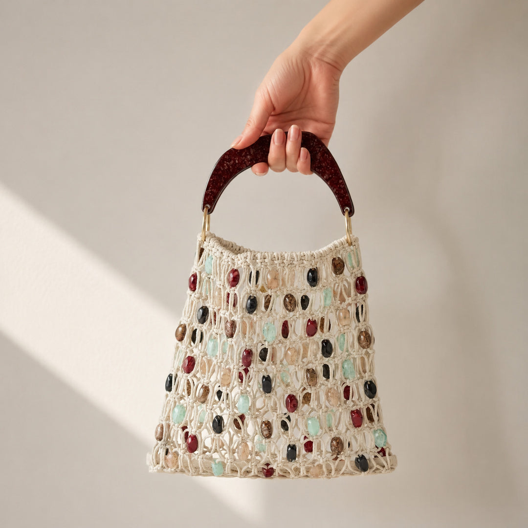 Handcrafted designer shoulder bag with unique stone accents Kalsten