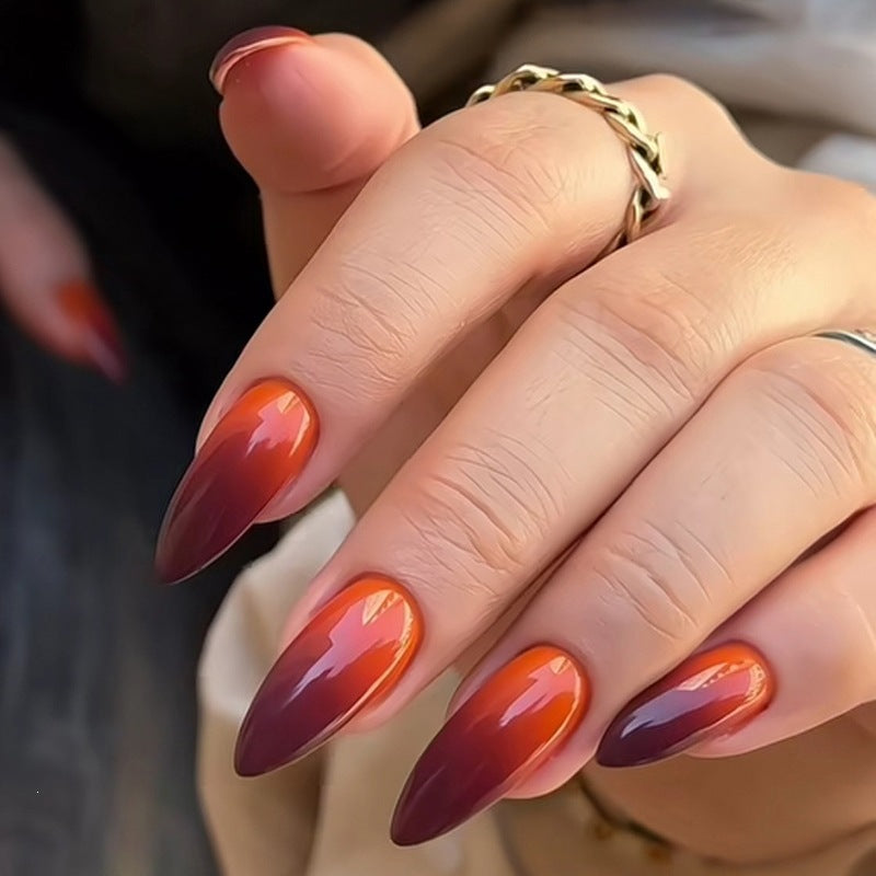 Acrylic nail set with luxurious color gradient and elegant lace accent Kalsten