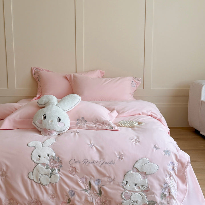 Children's bedding set with embroidered bunny appliqués, plush pillow and extra soft cotton satin