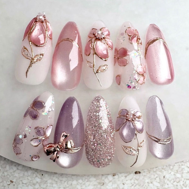 Artificial nail set with floral gold accents and elegant designs Kalsten