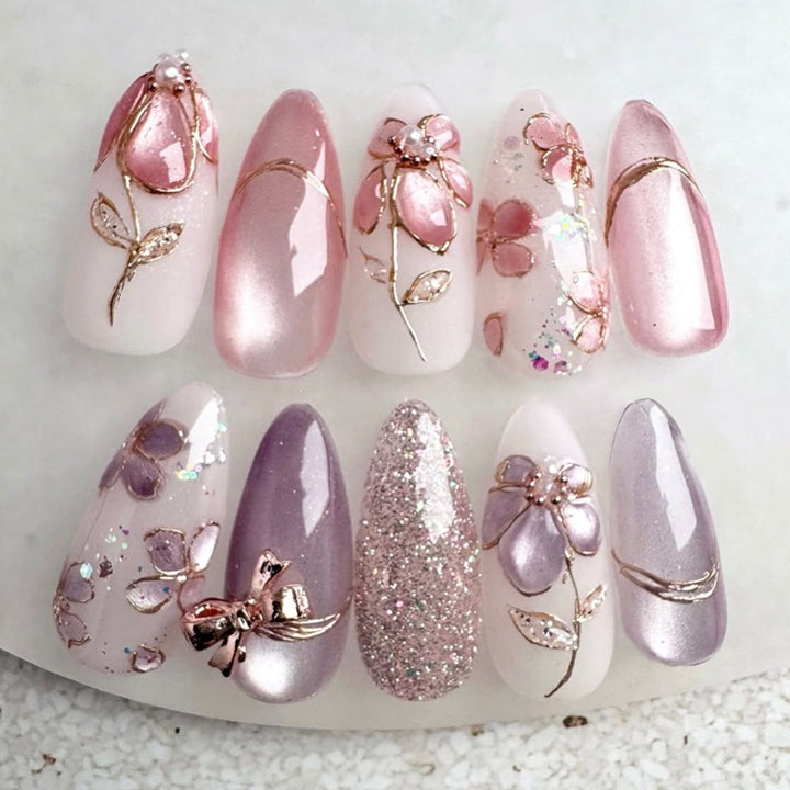 Artificial nail set with floral gold accents and elegant designs Kalsten