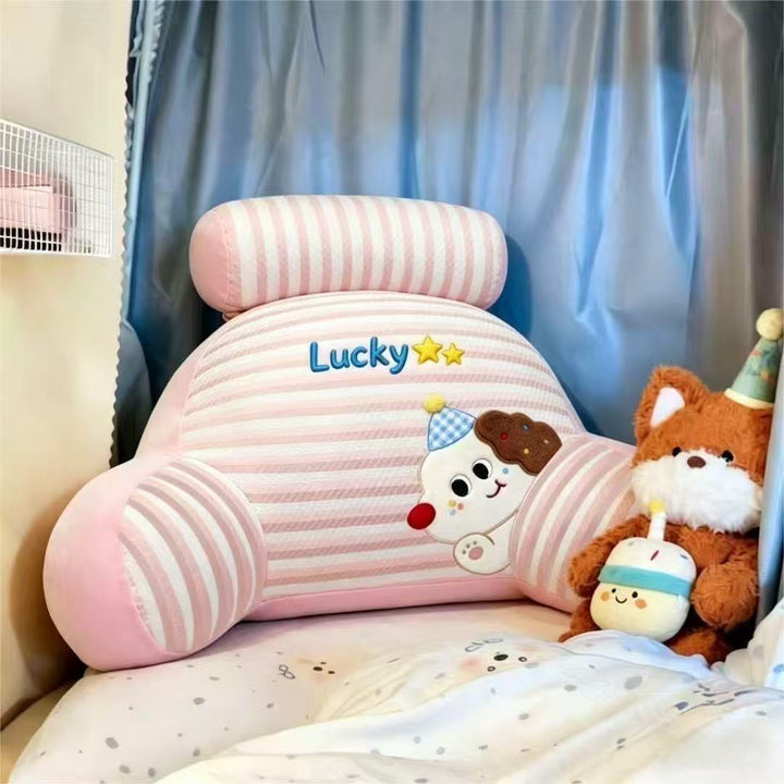 Ergonomic bed and reading pillow with neck roll, armrests and embroidered dog motif