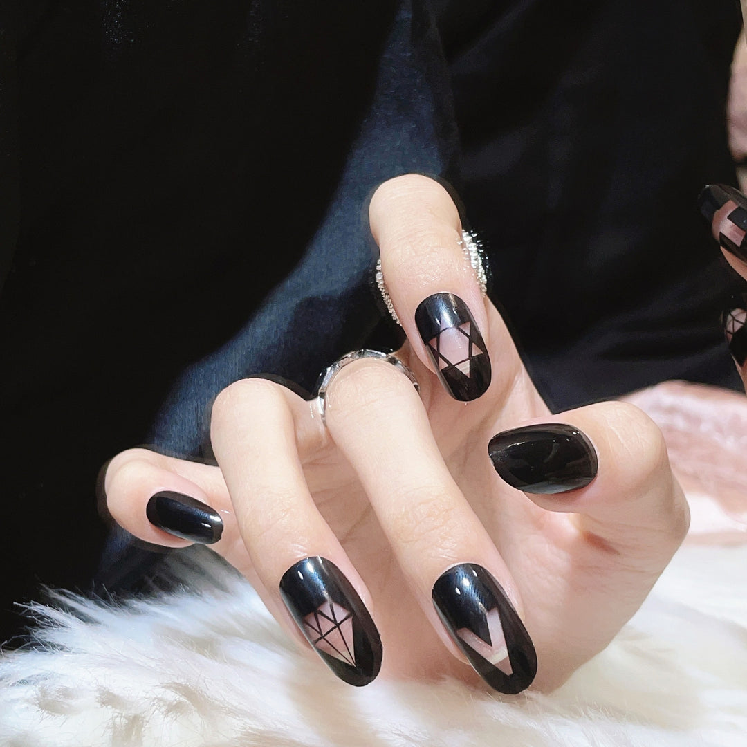 Artistic Press-On Nail Set with Geometric and Symbolic Designs