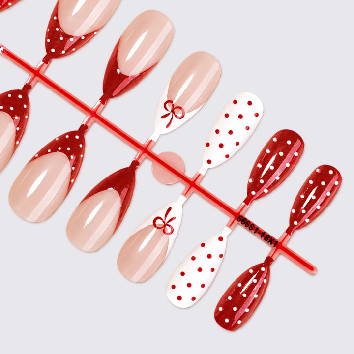 Nail set with elegant bows and polka dots Kalsten